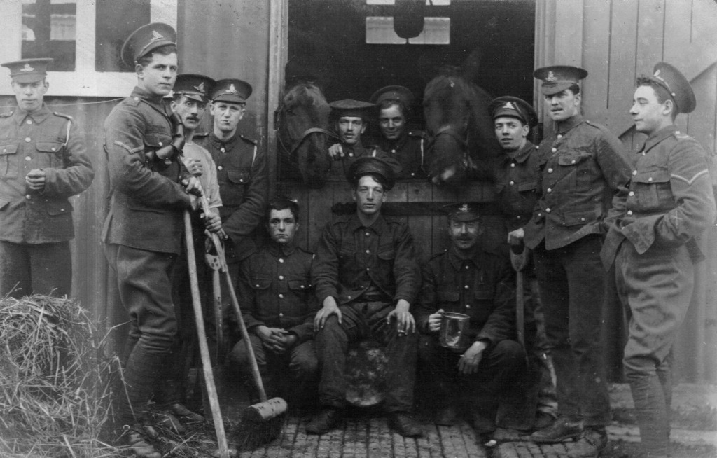 Photograph showing Frank Crawshaw in some stables